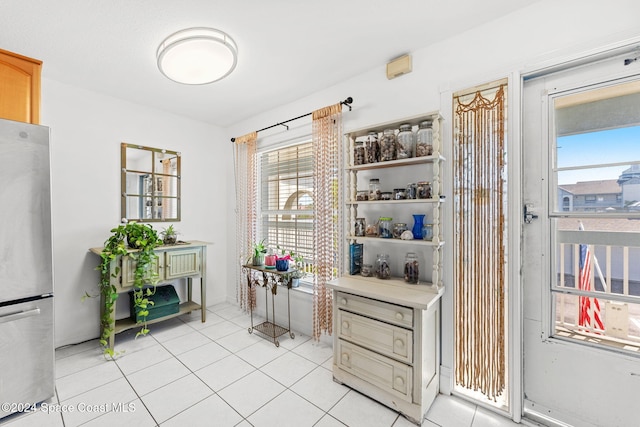 interior space featuring light tile patterned floors