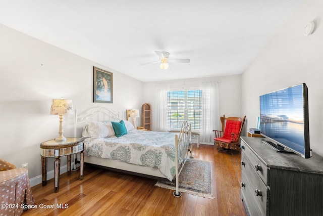 bedroom featuring ceiling fan and light wood-type flooring