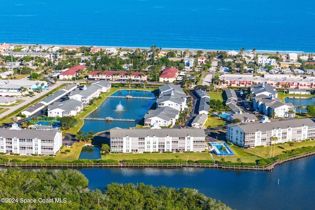 bird's eye view with a water view