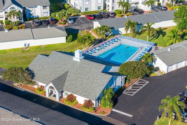 550 S Brevard Ave Unit 523, Cocoa Beach, FL 32931 - aerial perspective of suburban area with a pool