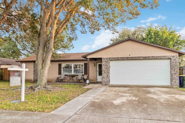 ranch-style home with a garage