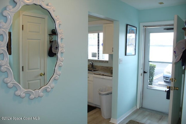 bathroom with vanity and wood-type flooring