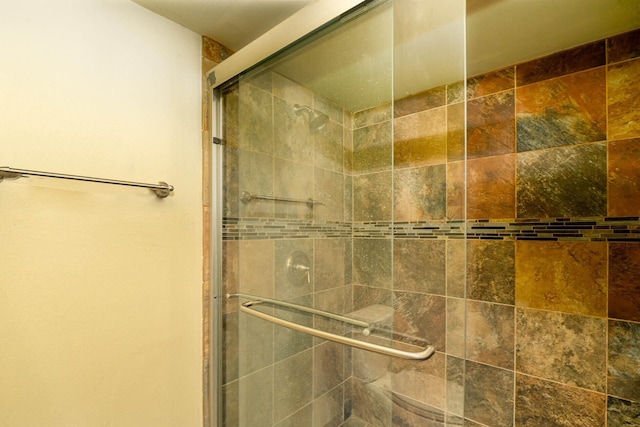 bathroom with an enclosed shower