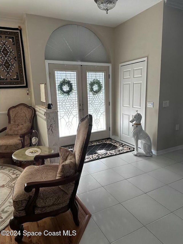 tiled entryway with french doors