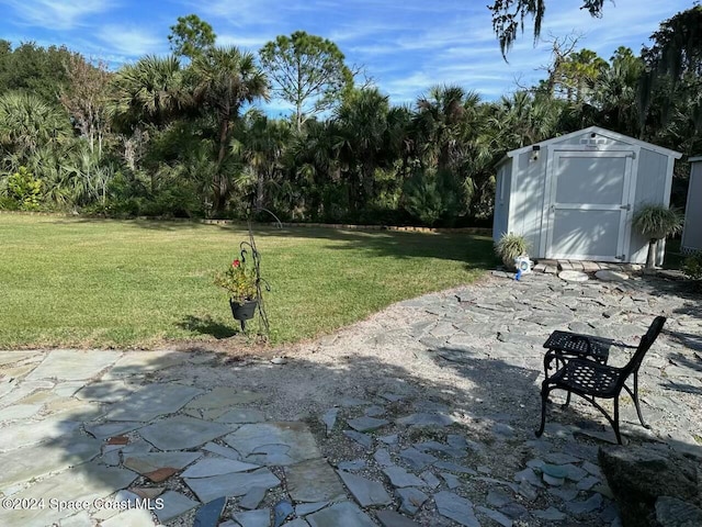 view of patio / terrace featuring a shed