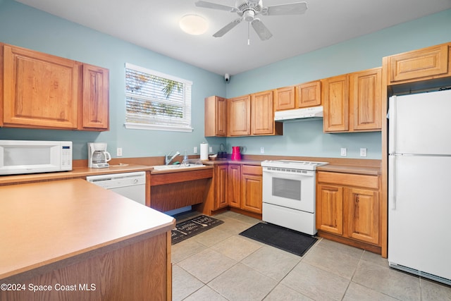 kitchen featuring light tile patterned flooring, white appliances, ceiling fan, and sink