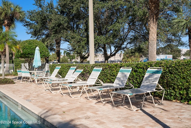 view of patio with a community pool