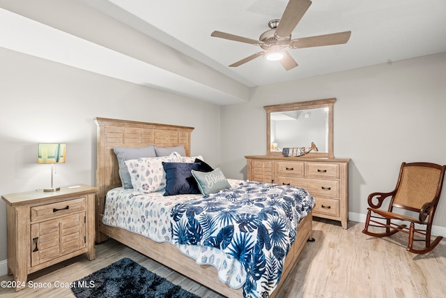 bedroom featuring ceiling fan and light hardwood / wood-style floors