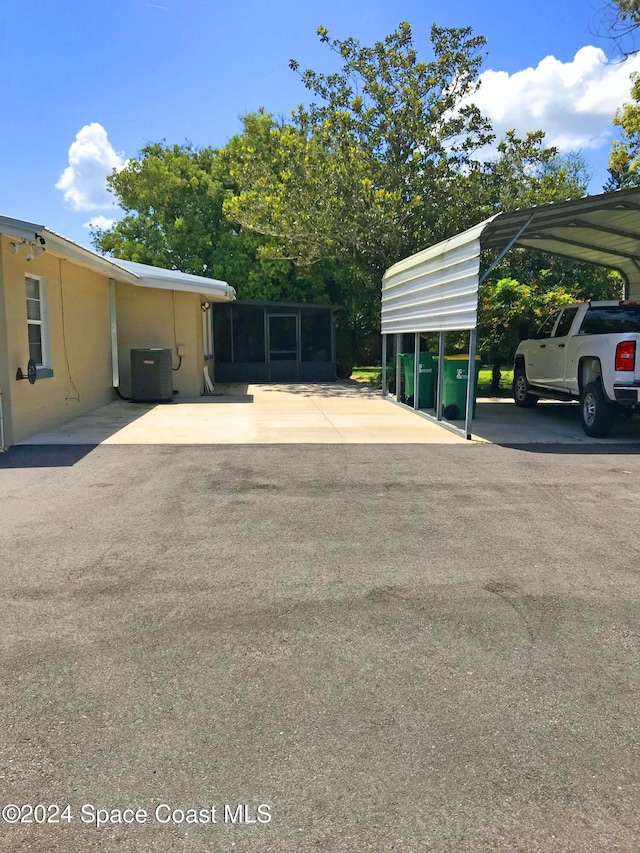 view of parking featuring a carport