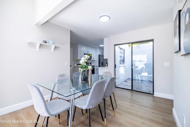 dining room featuring light hardwood / wood-style flooring