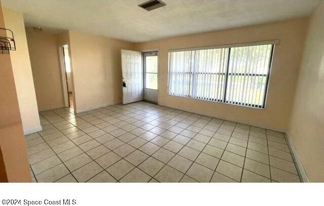 361 Payne Ave, Cocoa, FL 32927 - unfurnished room with light tile patterned flooring