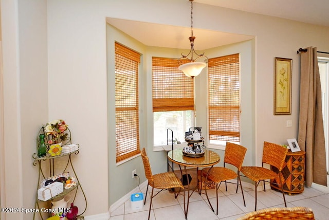 dining area with light tile patterned floors