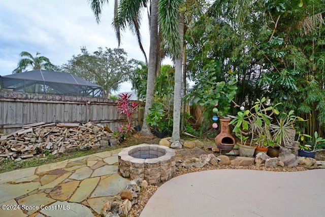 view of patio / terrace featuring a fireplace