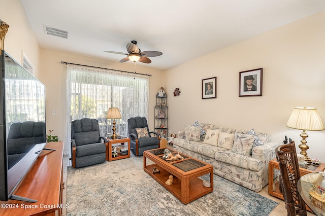 living room featuring ceiling fan