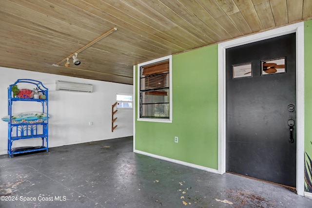 interior space with wood ceiling and a wall mounted air conditioner