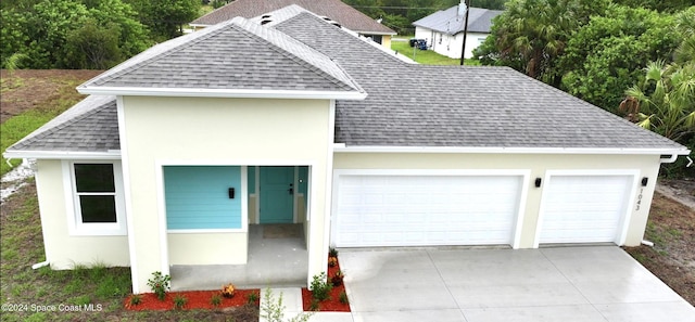 view of front of home featuring a garage