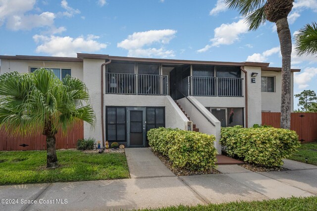 641 Ridge Club Dr Unit 21, Melbourne, FL 32934 - view of property with stairs