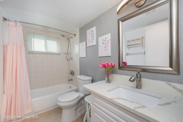 641 Ridge Club Dr Unit 21, Melbourne, FL 32934 - bathroom featuring shower / bath combo with shower curtain, toilet, vanity, and tile patterned floors