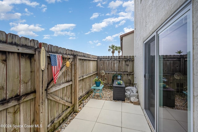 641 Ridge Club Dr Unit 21, Melbourne, FL 32934 - fenced backyard featuring a patio area