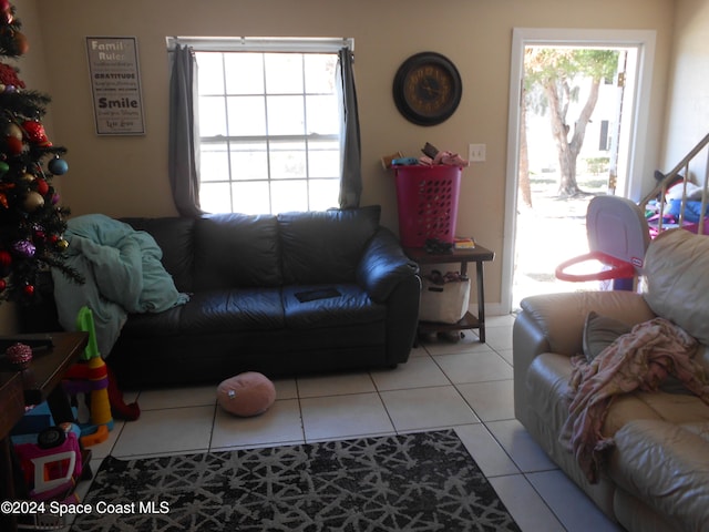 living room with light tile patterned floors