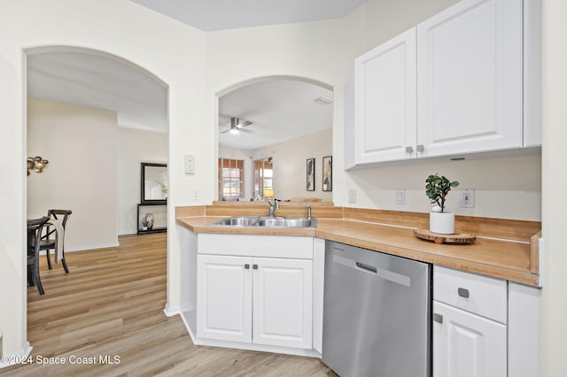 kitchen with dishwasher, sink, light hardwood / wood-style flooring, ceiling fan, and white cabinetry