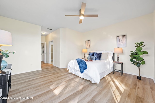 bedroom featuring ceiling fan and light wood-type flooring