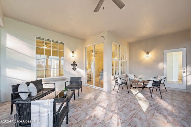 view of patio / terrace featuring outdoor lounge area and ceiling fan