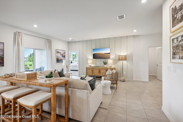 living room featuring light tile patterned flooring