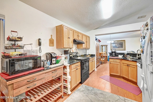 kitchen with a notable chandelier, light hardwood / wood-style floors, vaulted ceiling, a textured ceiling, and black appliances