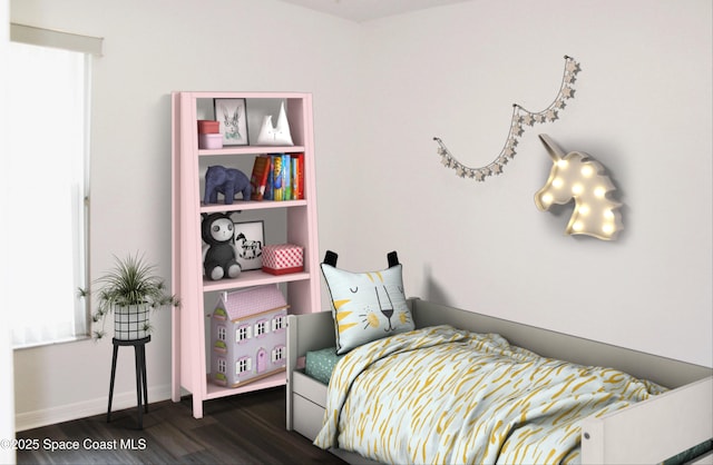 bedroom featuring dark wood-style floors and baseboards