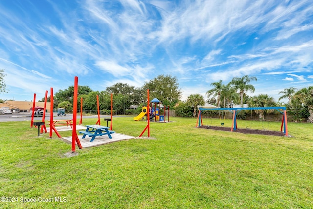 view of playground featuring a yard