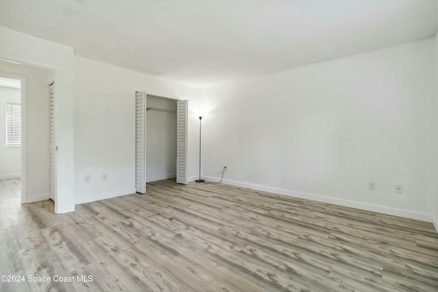 unfurnished bedroom featuring light hardwood / wood-style flooring