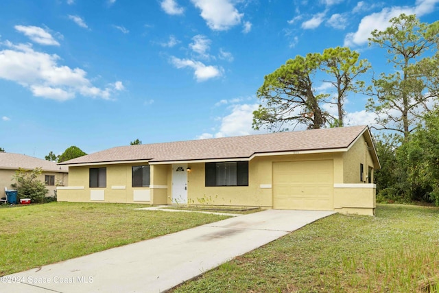 ranch-style house with a front yard and a garage