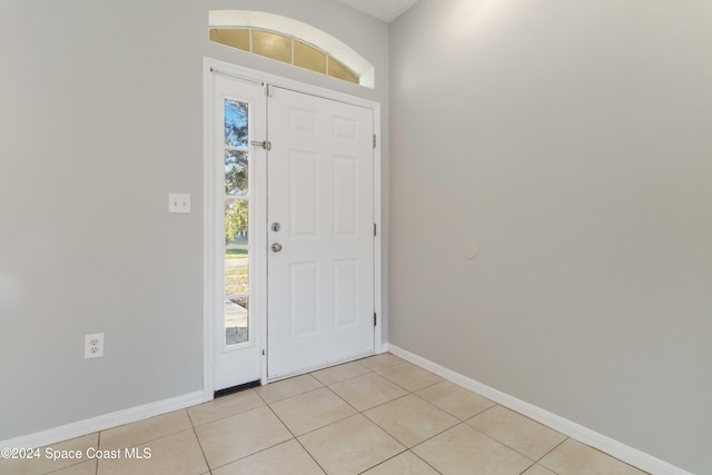 view of tiled foyer entrance