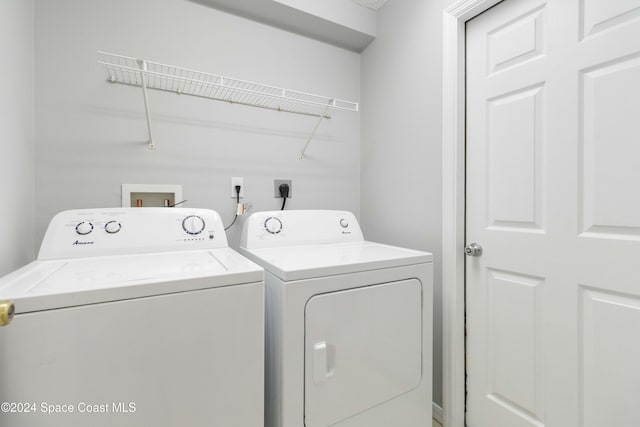 washroom with washer and clothes dryer