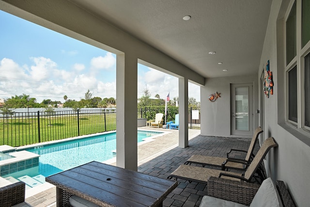 view of pool with a patio area