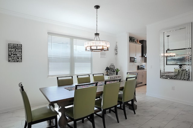 dining area featuring a chandelier and ornamental molding