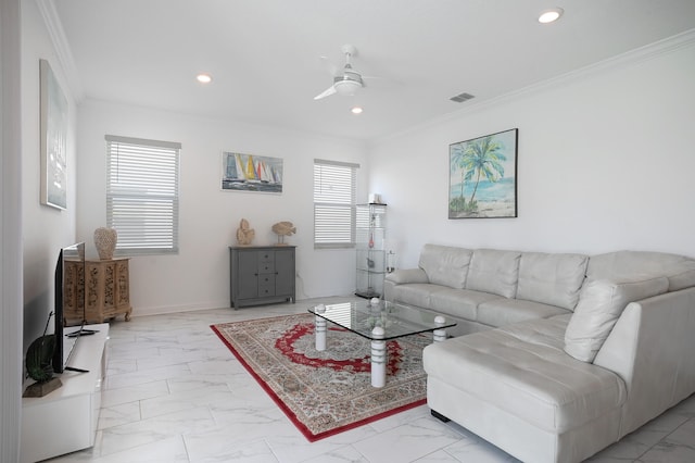 living room with ceiling fan and ornamental molding