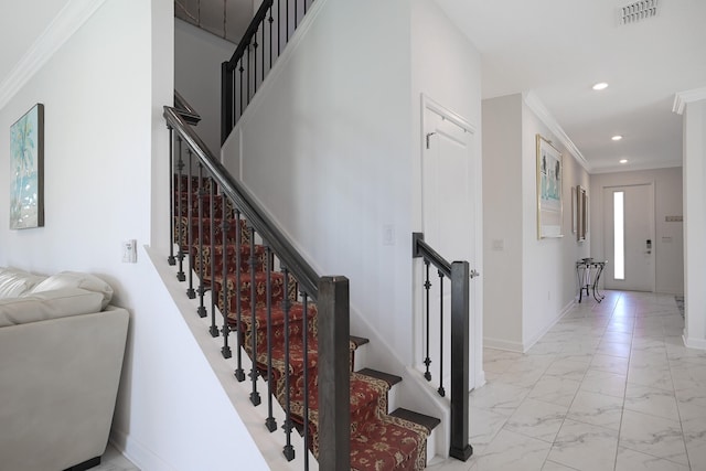 stairway with crown molding