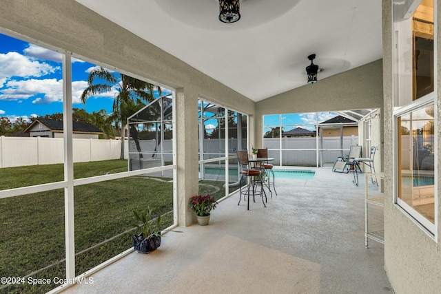 view of patio / terrace featuring a fenced in pool and a lanai