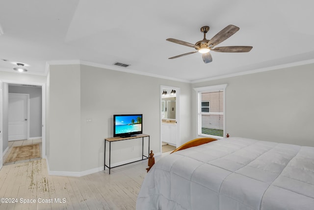 bedroom with ceiling fan, light wood-type flooring, ornamental molding, and ensuite bath