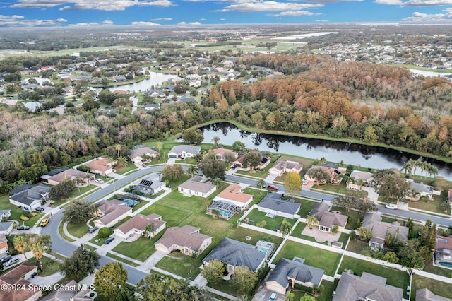 birds eye view of property featuring a water view