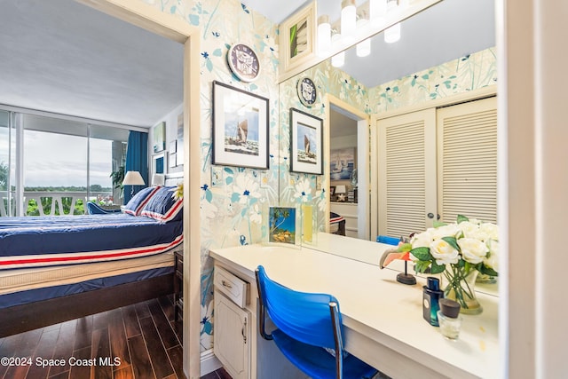 2505 S Ocean Blvd Unit 5030, West Palm Beach, FL 33407 - bathroom featuring wallpapered walls, wood finished floors, and vanity