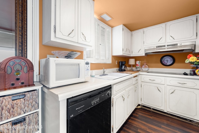 kitchen featuring white cabinets, dark hardwood / wood-style flooring, white appliances, and sink