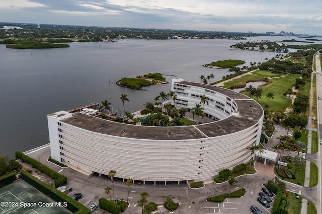 birds eye view of property featuring a water view