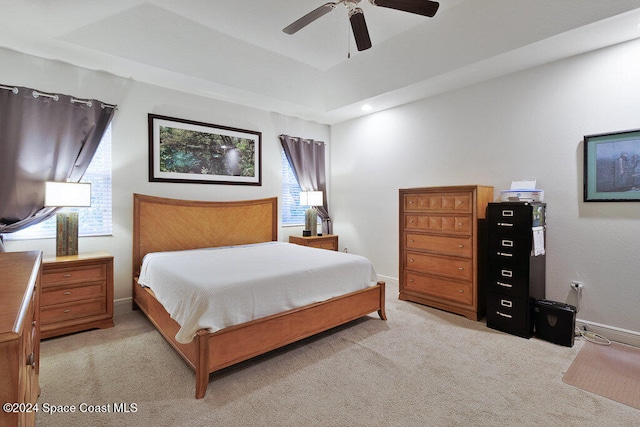 bedroom with light colored carpet and ceiling fan