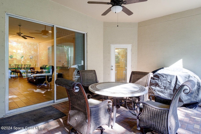 view of patio / terrace featuring ceiling fan