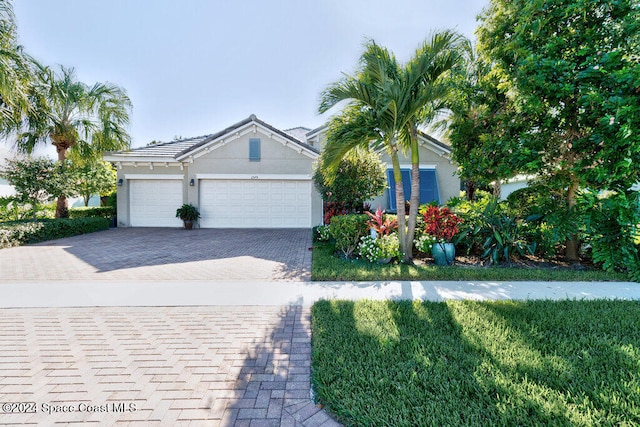 view of front of property with a garage