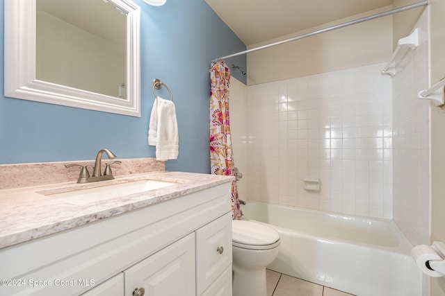 full bathroom featuring tile patterned flooring, vanity, toilet, and shower / bathtub combination with curtain