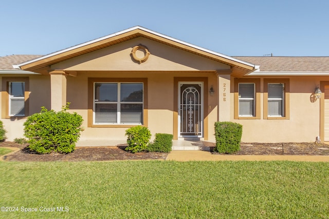 ranch-style house with a front yard